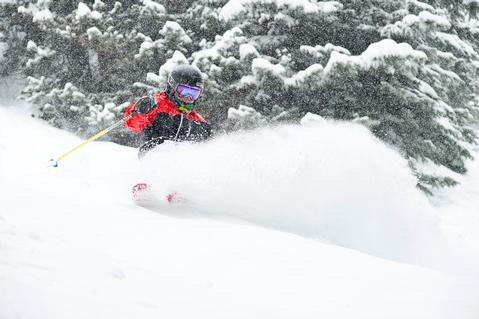 A skier glides through Vail powder (photo © Connor Walberg/Vail Mountain Resort).