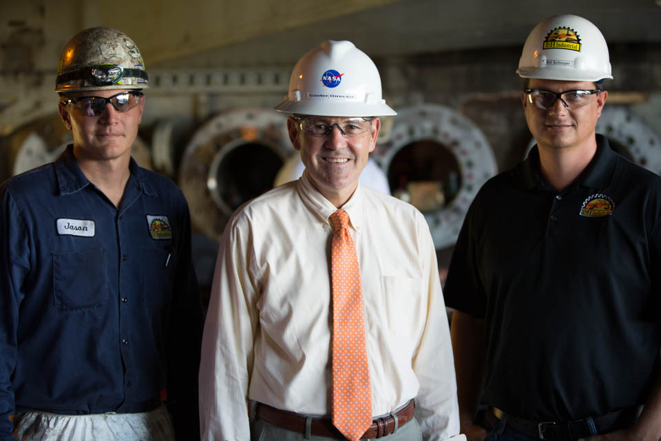 Jason Percifield, L&H Field Manager for the NASA Crawler Transporter project; Robert Cabana, Kennedy Space Center Director; Bill Schroyer, L&H Project Manager for the NASA Crawler Transporter project