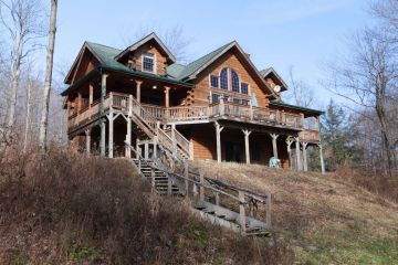 This 5 bedroom log home is located on 8 acres near Livingston Manor, New York.  $519,000. Listing 35094. For more information, call Stacy Keck-Colliton at 845-586-3321.