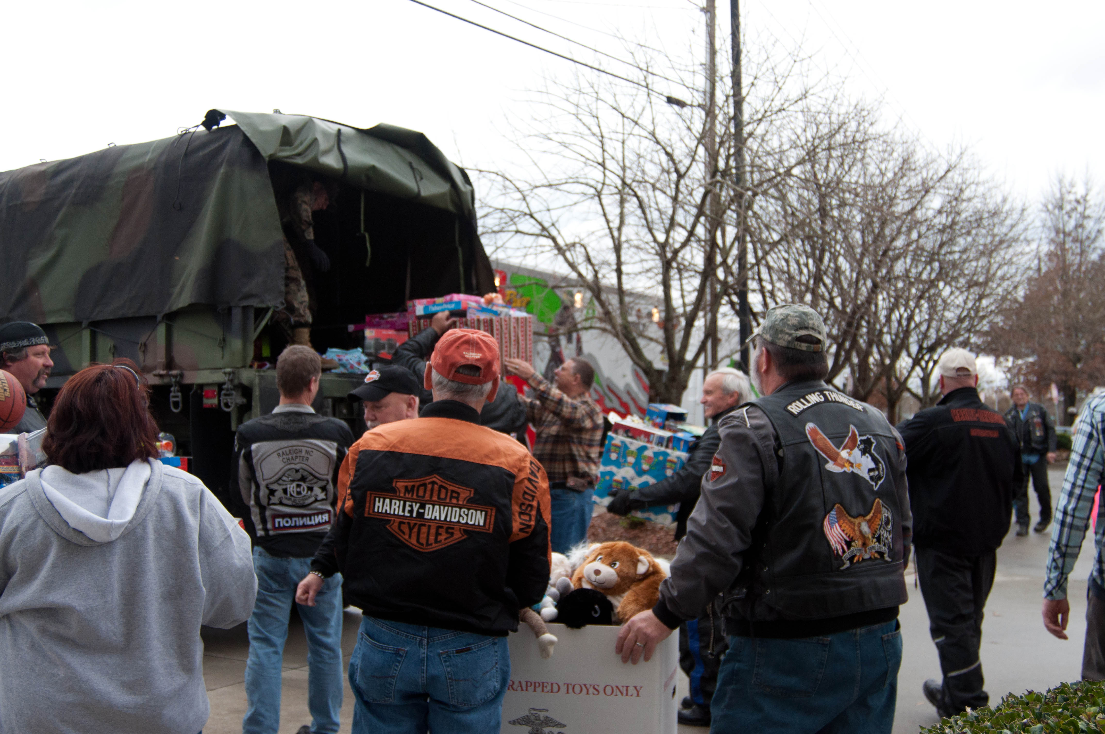 Raleigh H.O.G. members and Ray Price Harley-Davidson load 3 truckloads of bikes and toys for the Marines Toys for Tots campaign.