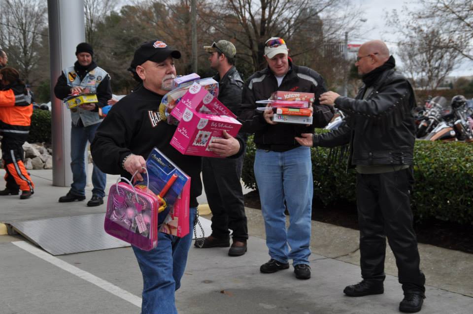 Raleigh H.O.G. and Ray Price Harley-Davidson deliver Toys for Tots to help local children have a great Christmas.