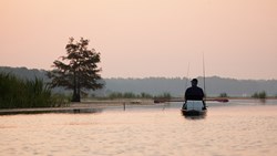 A photo of a kayak fisherman