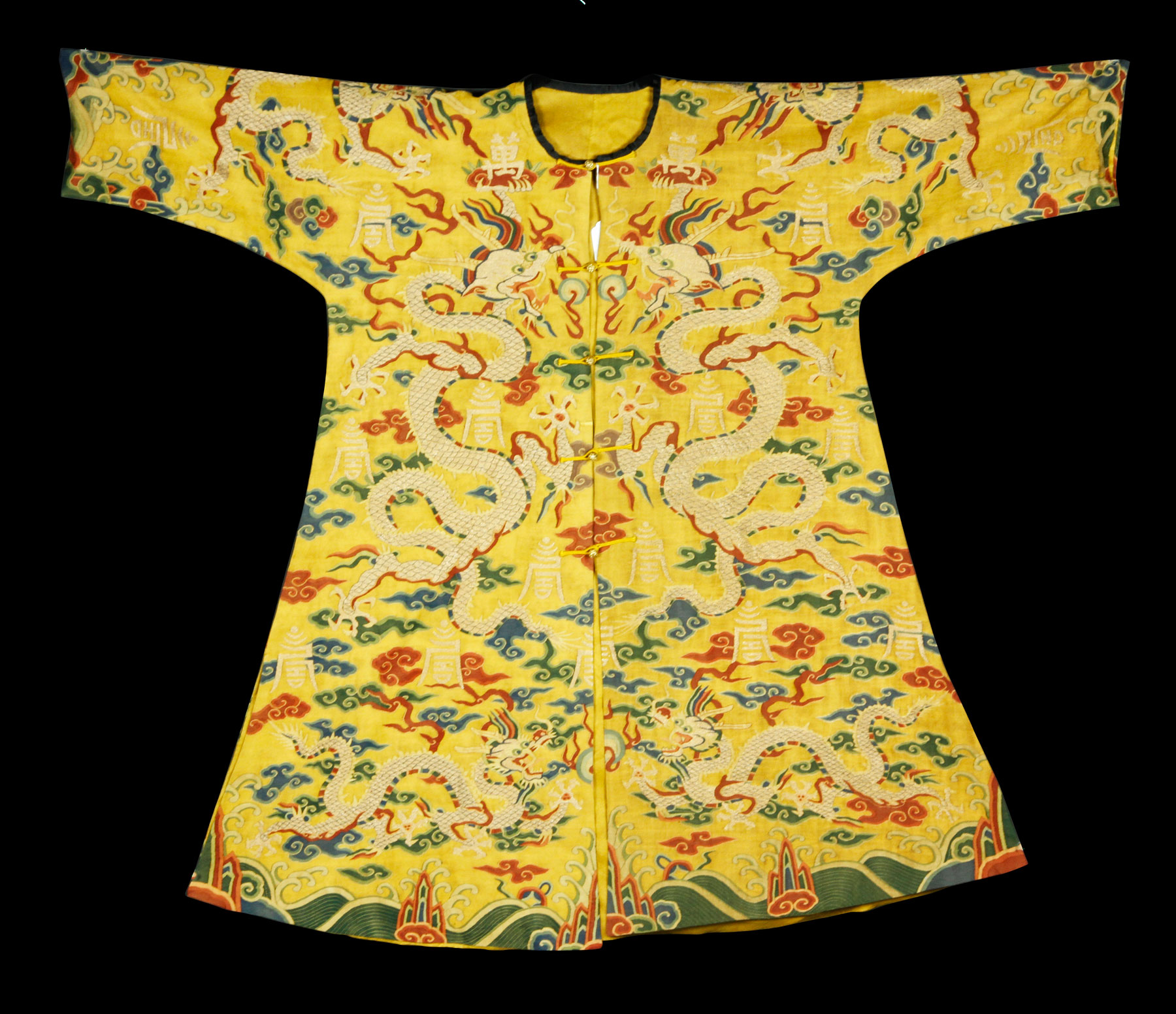Imperial kesi dragon robe, China, Qing Dynasty (1644-1911), the front woven with a pair of magnificent five-clawed dragons facing each other in gold thread, on an imperial yellow background, 41" x 28"