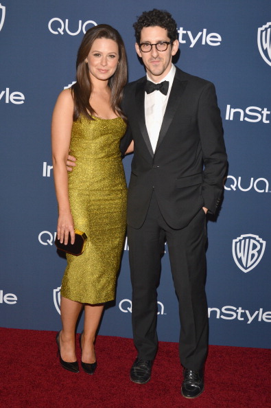 Actress Katie Lowes with the Jill Milan Octagon clutch at InStyle/Warner Bros. Golden Globe party, here with actor/producer Adam Shapiro. Jan 12, 2014, Beverly Hills. (Photo: Lester Cohen/WireImage)