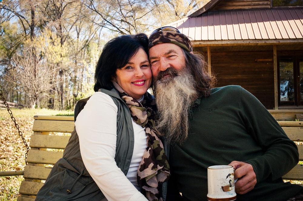 Miss Kay and Phil Robertson.  "Faith, Family and Food -- Bringing Our Home to Your Table"