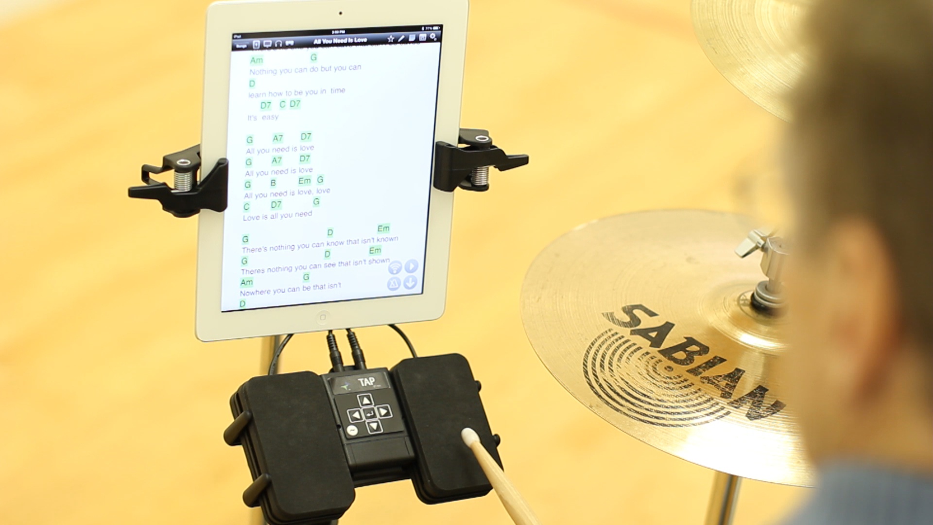Turn digital sheet music pages with the TAP