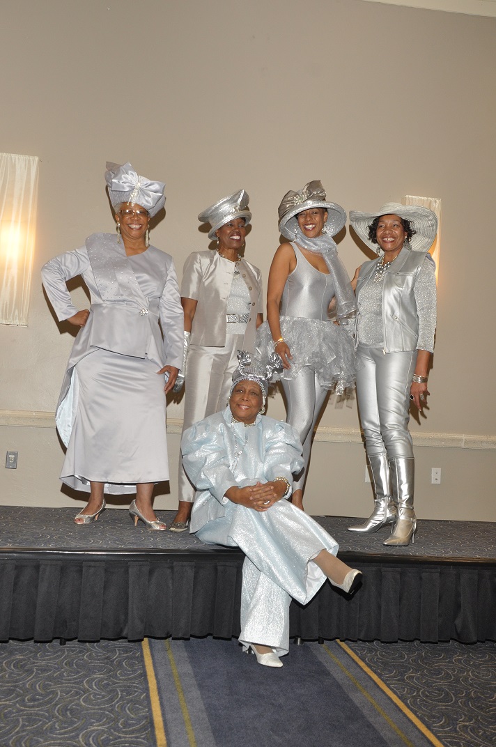 Mrs Moore and her friends at the HATitude Brunch Party where the participants are the stars.