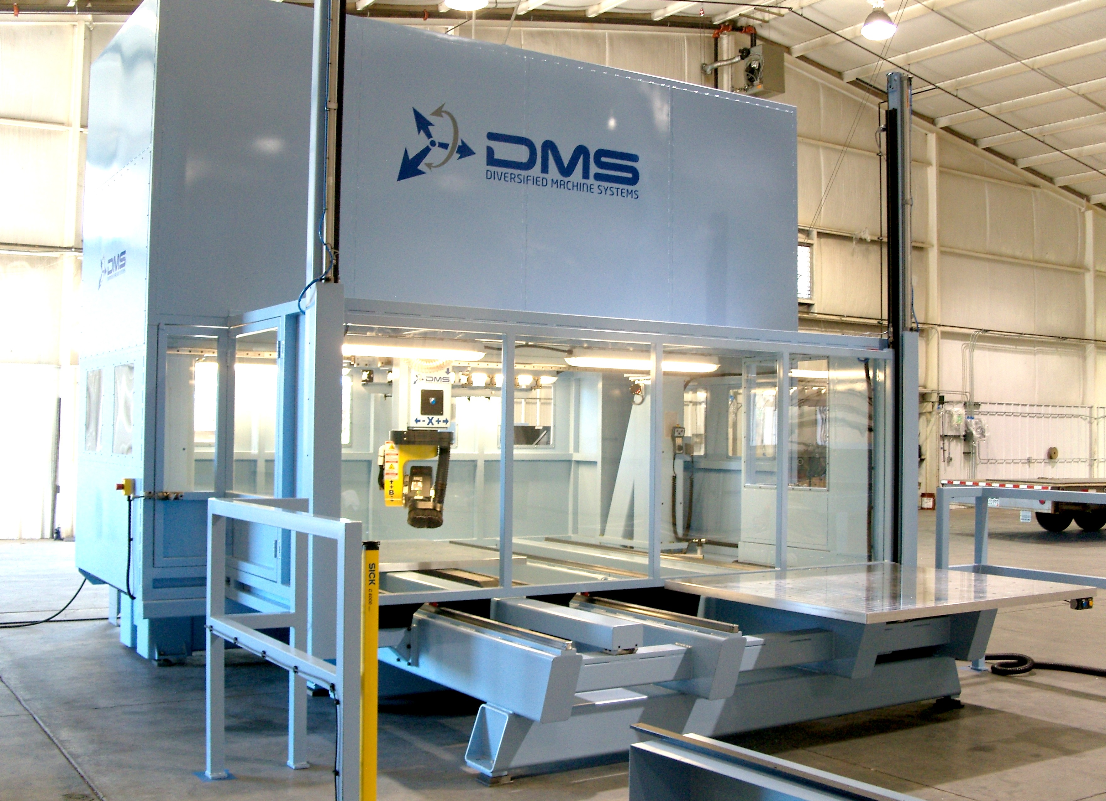 DMS Enclosed Twin Table 5 Axis CNC Machine Center