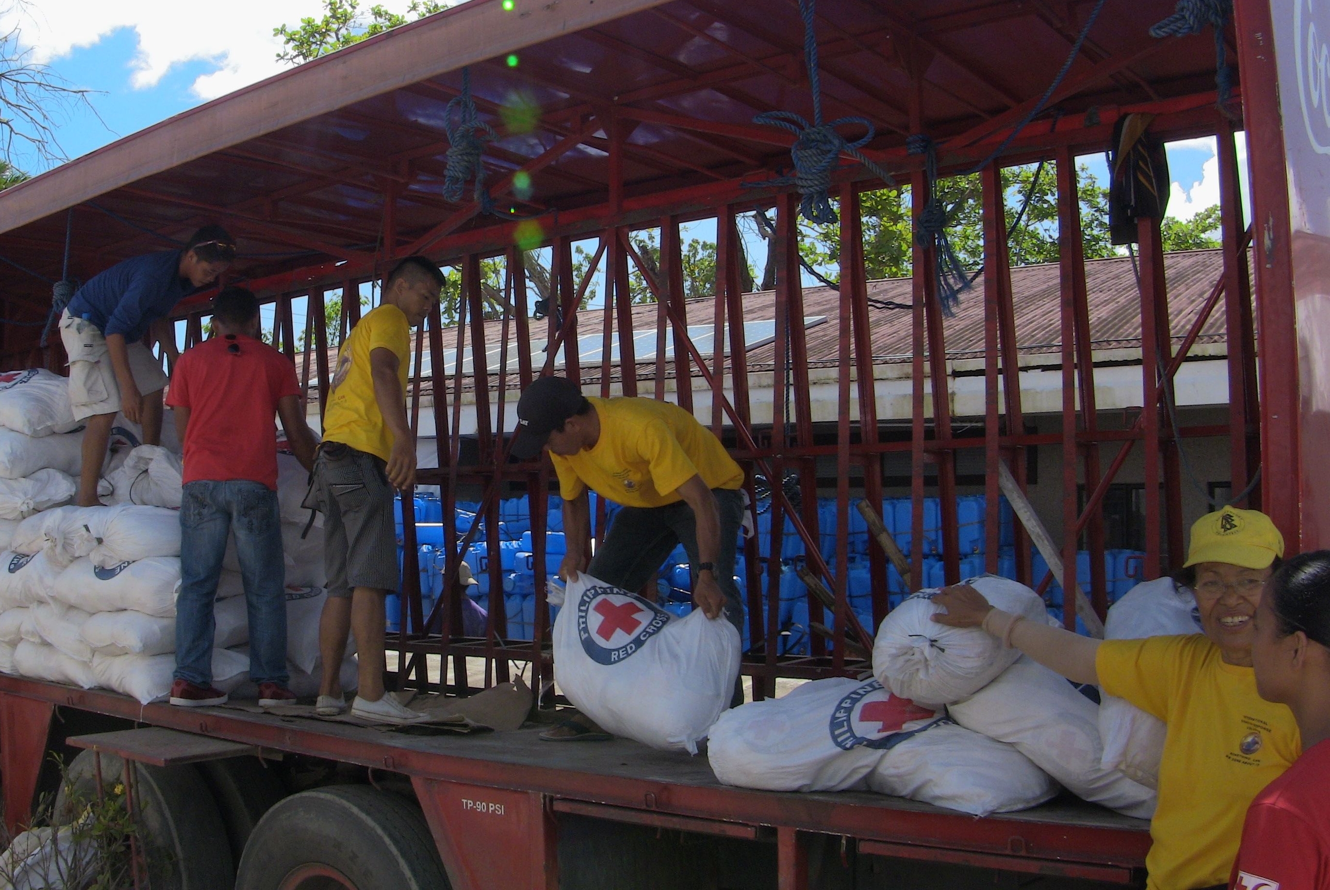 Scientology Volunteer Ministers distribute supplies to the victims of Typhoon Yolanda (Haiyan) in the Philippines.