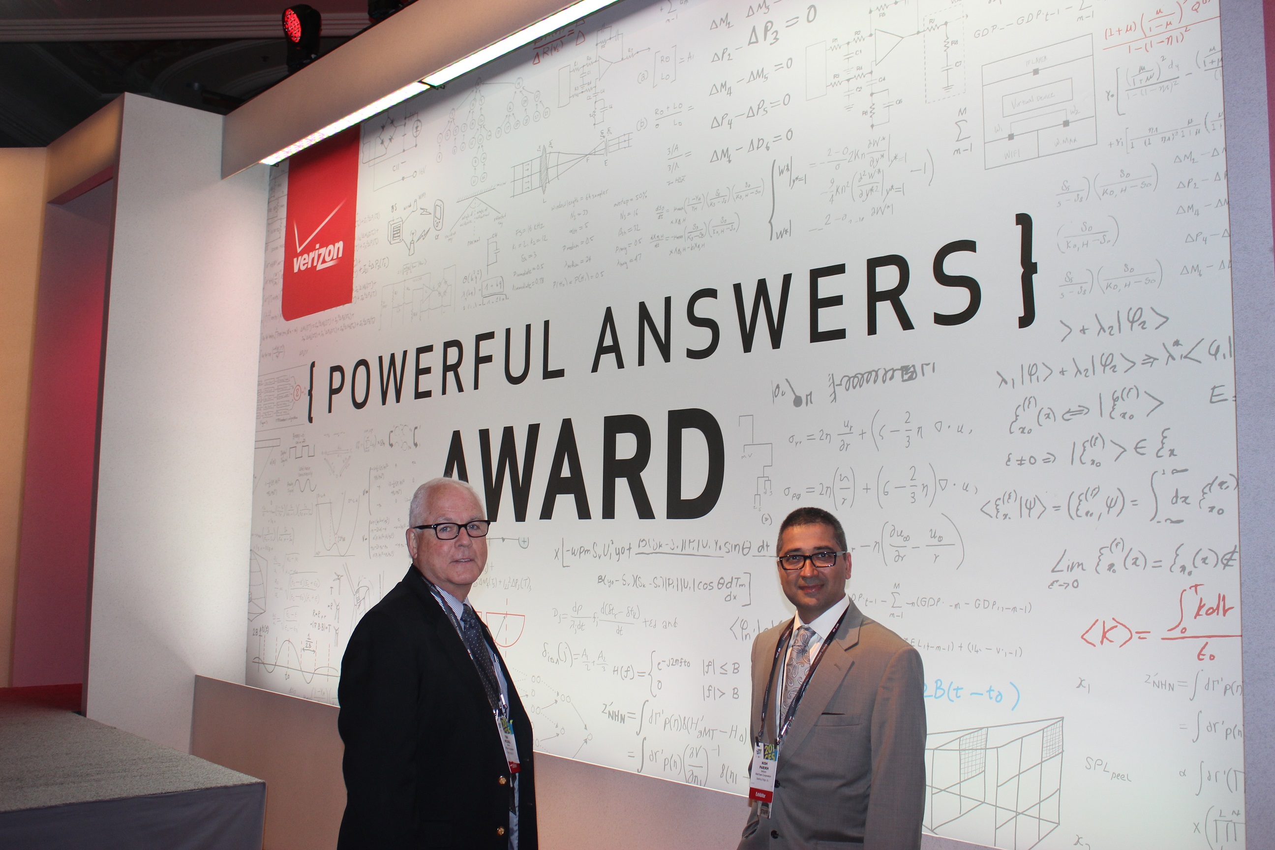 Tom McCool (left) and Nish Parikh (right) at Verizon Powerful Answers Award Contest at the 2014 International CES in Las Vegas