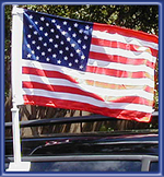 Fly a flag from a vehicle window