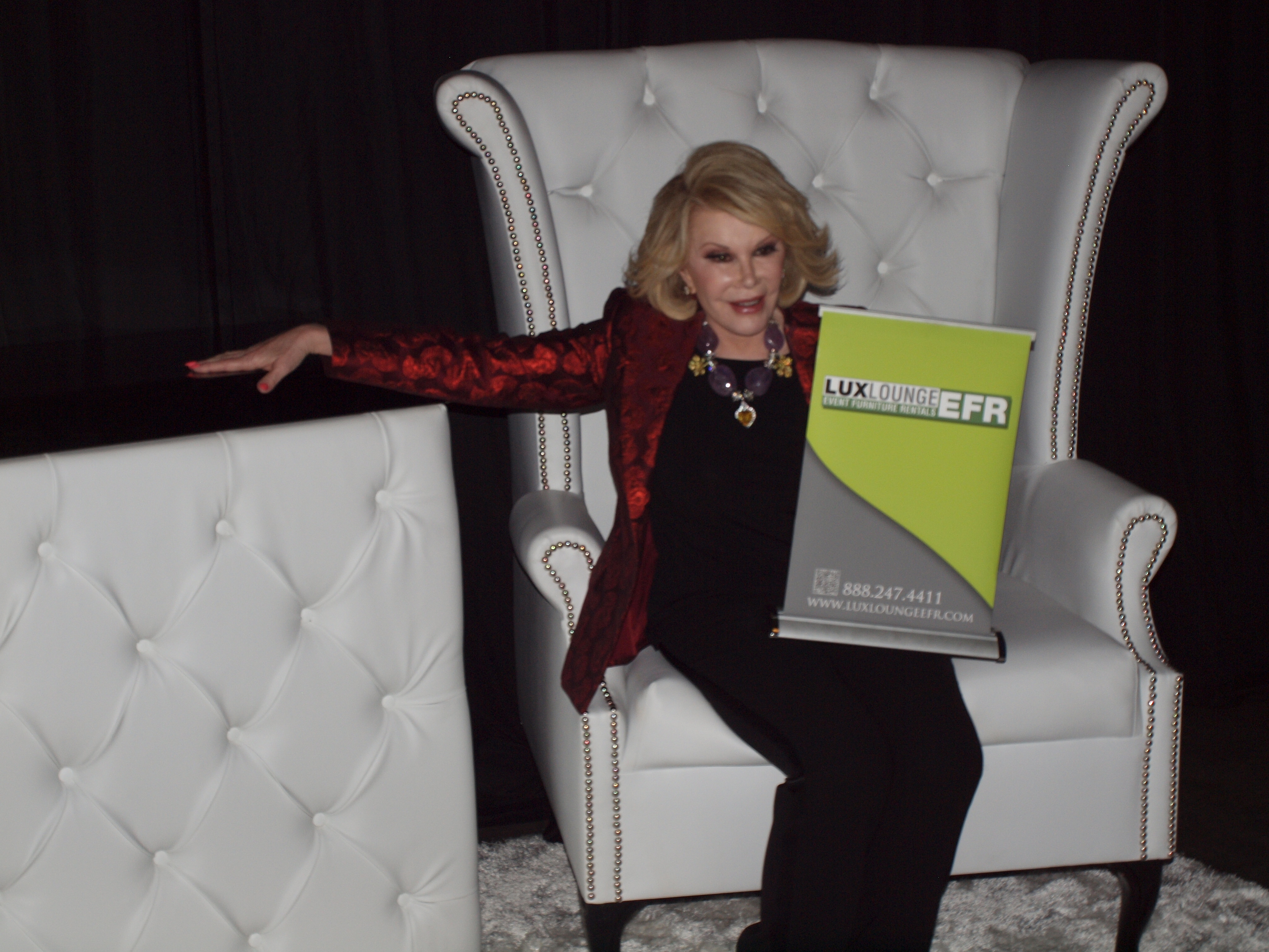 Entertainment Legend Joan Rivers at the Ultimate Woman's Expo, enjoys the custom made leather chair designed Lux Lounge EFR