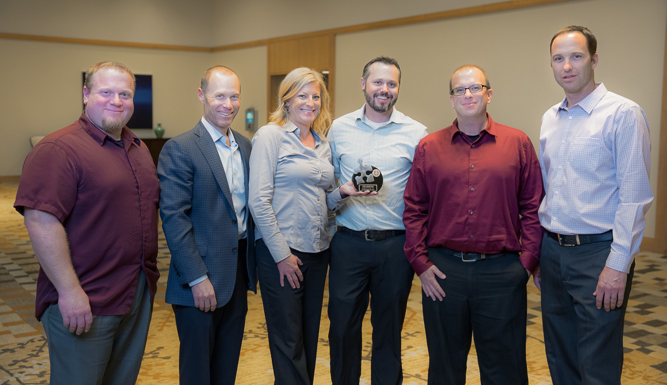 (Left to Right) Baker Electric Inc. representatives with AGC Award -- Dan Gillogly, Ted Baker, Angie McAnelly, Tim Dunbar, Brian Farr and Todd Albright.