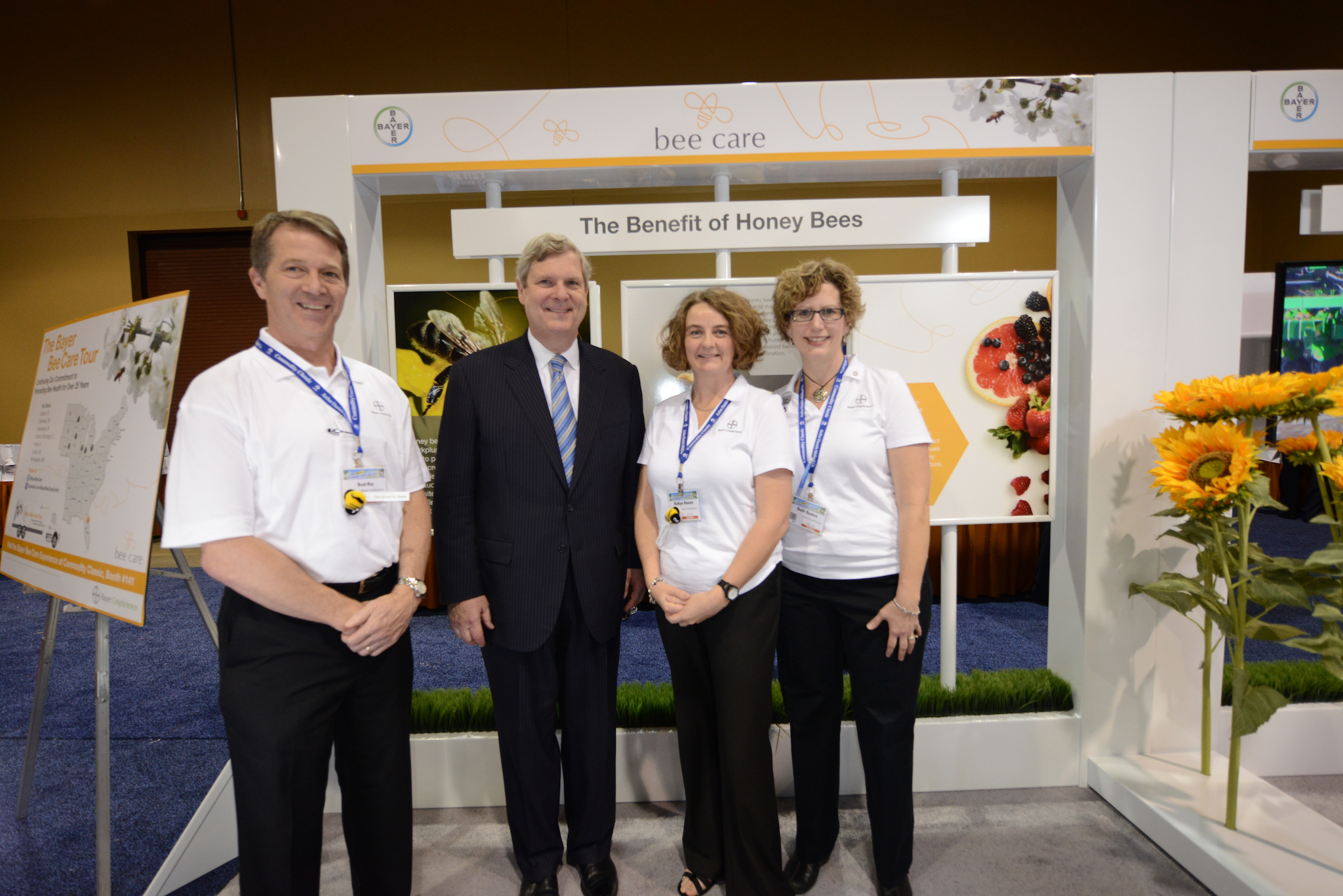 Secretary of Agriculture, Tom Vilsack, experiencing the Bee Care Tour exhibit with the Bayer CropScience North American Bee Health Team