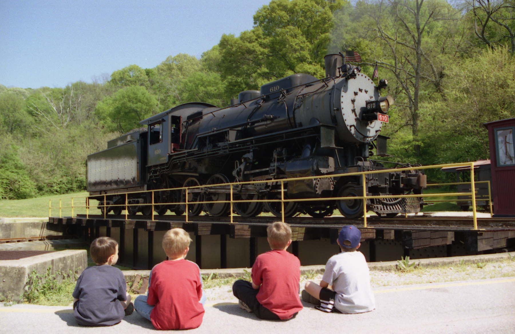 Kids watching the engine at the turn station during the Spring Break Safari at the TN Valley Railroad.