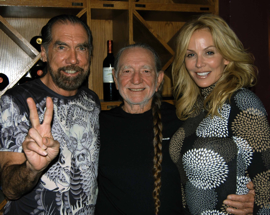 Recipients of the Ann Richards Founders Award, John Paul and Eloise DeJoria,with Willie Nelson at the inaugural Nobelity Project Dinner