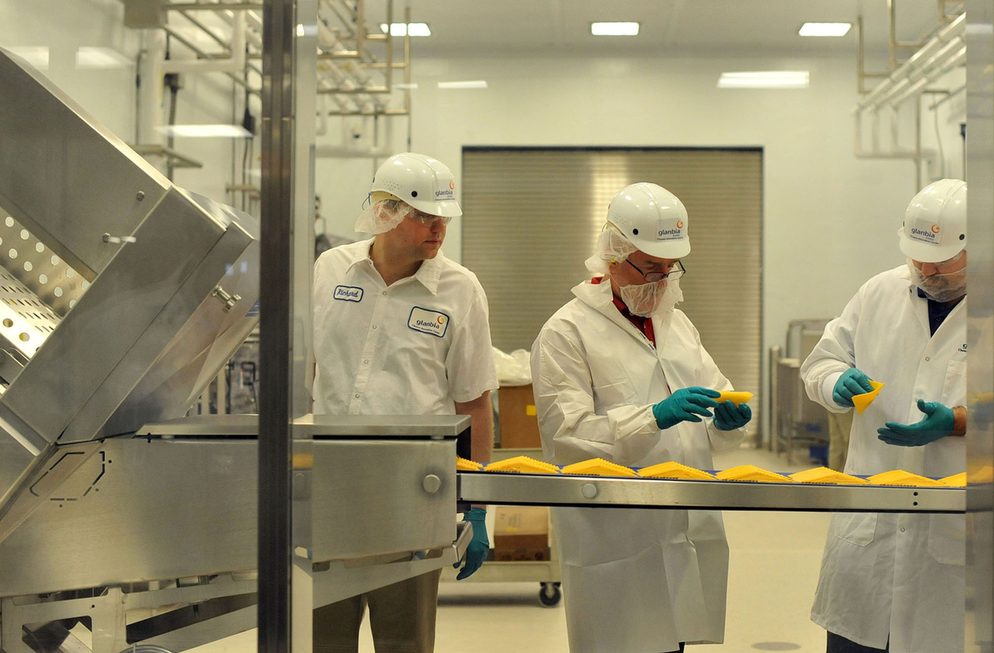 Workers at Glanbia Foods’ new state-of-the-art Cheese Innovation Center in Twin Falls, Idaho.  Photo credit:  Ed Glazar, Times-News