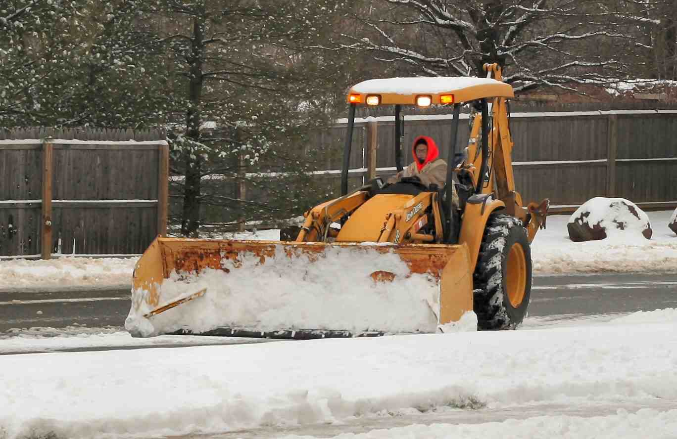 Snowplow drivers must use extreme caution when working in areas with pedestrians.