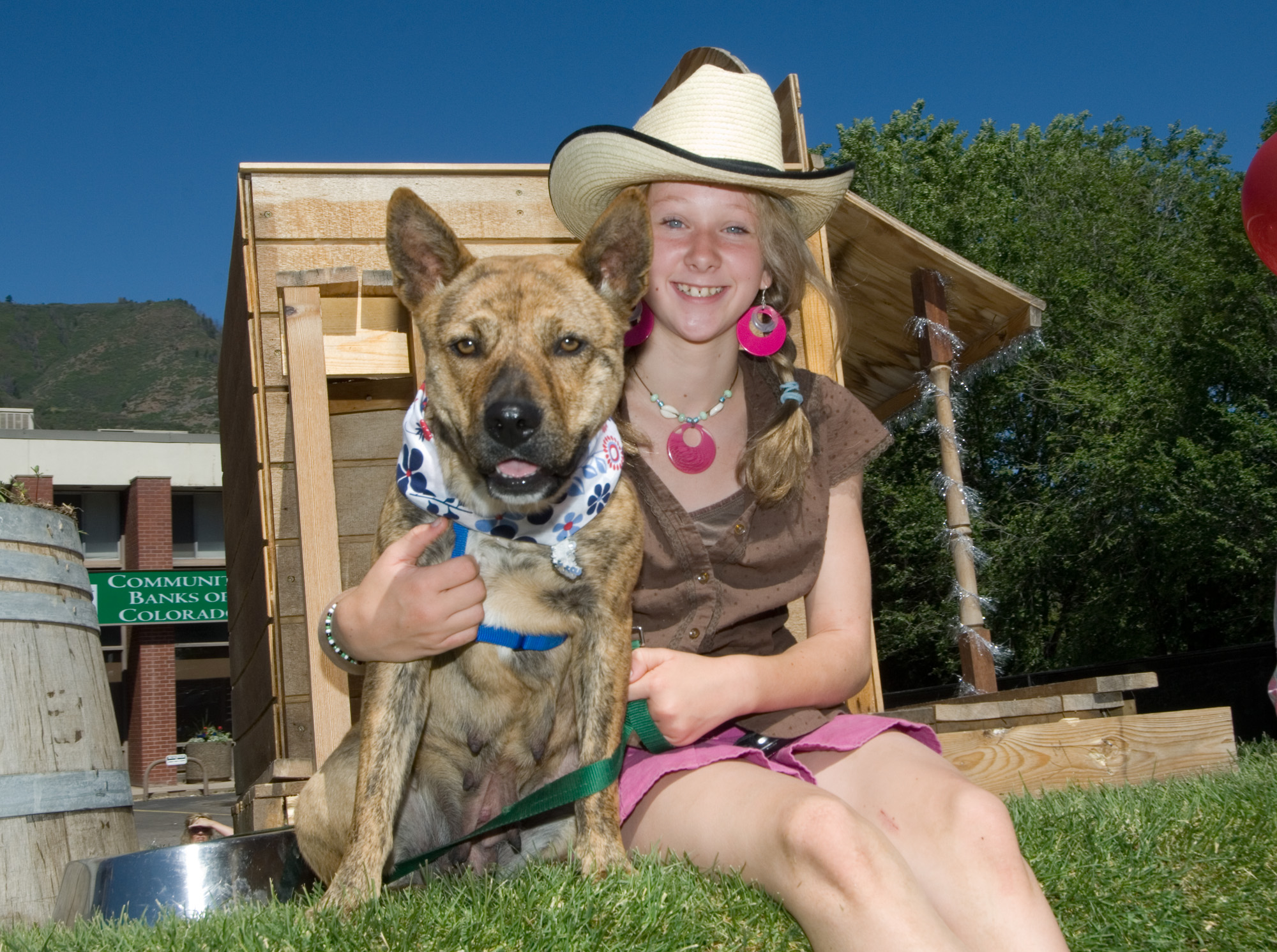 Dogs are welcome at many venues and events, including this one and his owner at the annual Strawberry Days festival