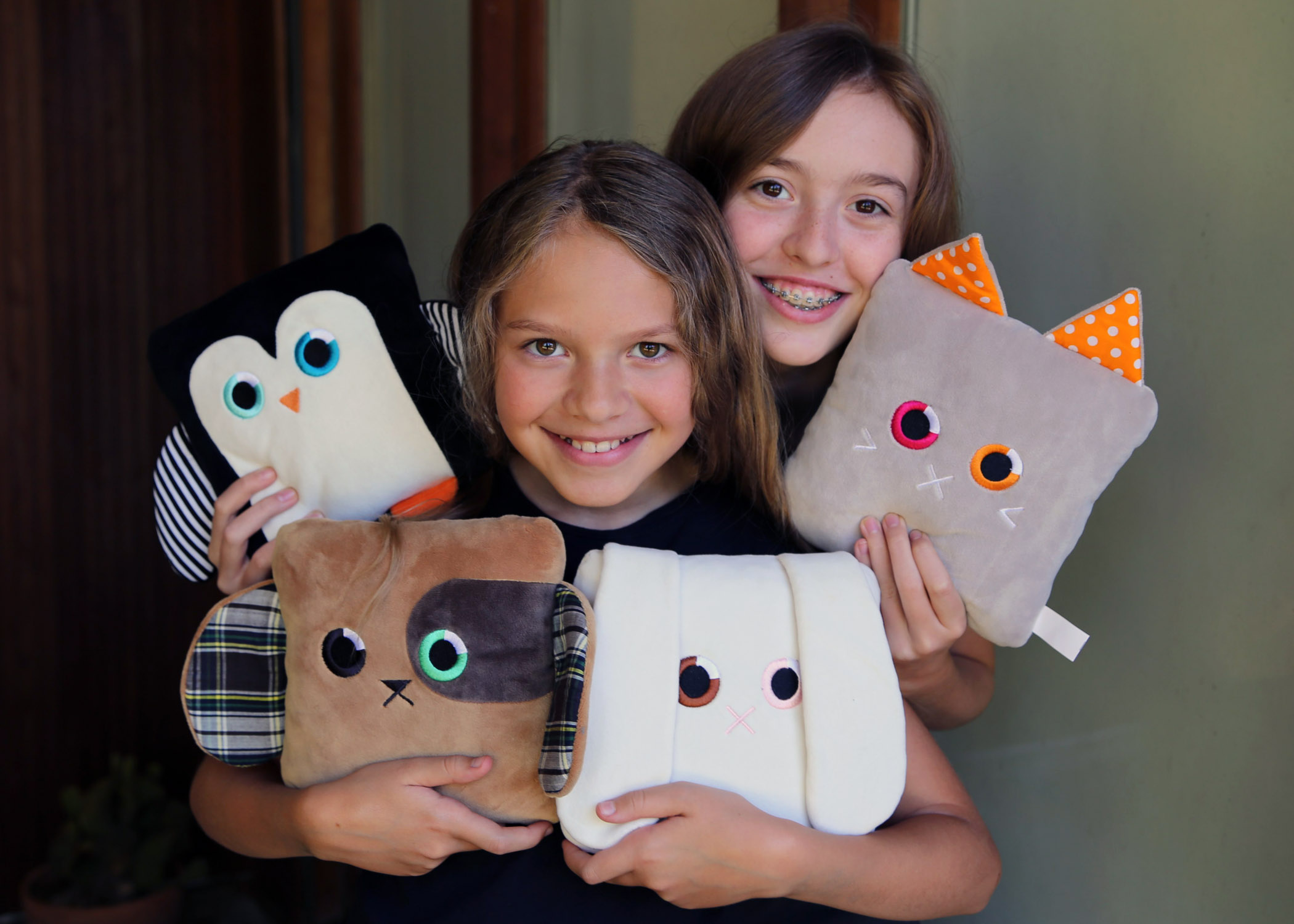 Sisters Sydney and Toni Loew, creators of Poketti Plushies with a Pocket