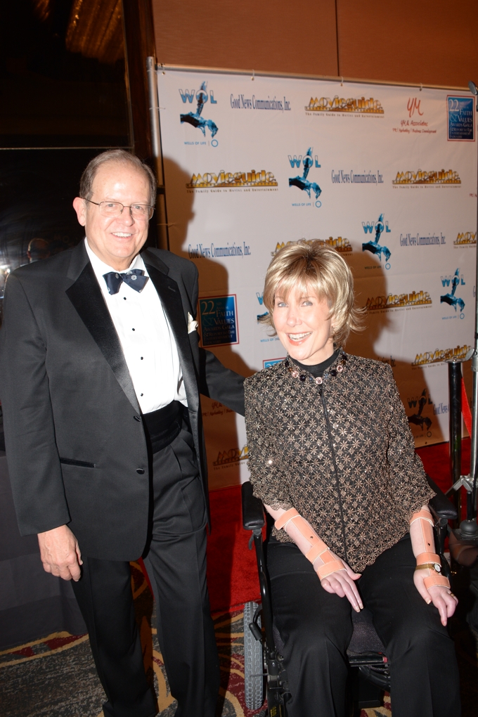 Dr. Ted Baehr with Joni Eareckson Tada the voice behind "Alone Yet Not Alone" backstage  at the Official Backstage Movieguide® Awards Gifting Suite Experience