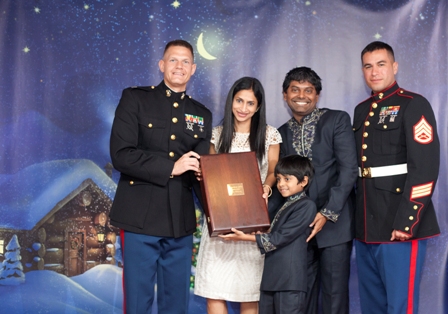 MGE Management Experts Clients Dr. Arvind Philomin and Dr. Divya Adusumilli Receive Toys for Tots Award