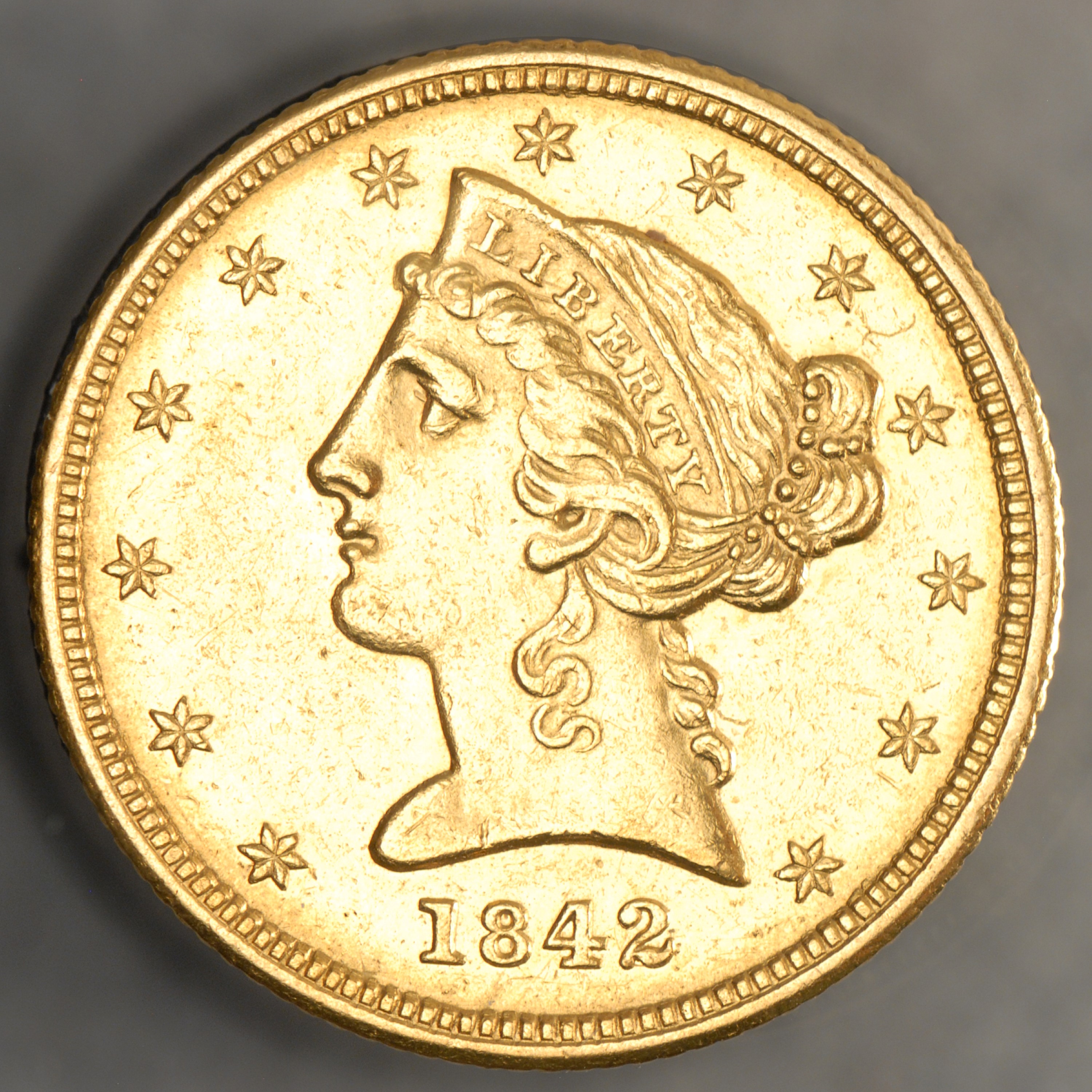 This $5 denomination gold coin was struck in 1842 in Dahlonega and will be displayed with other historic Georgia coins and paper money at the National Money Show in Atlanta.