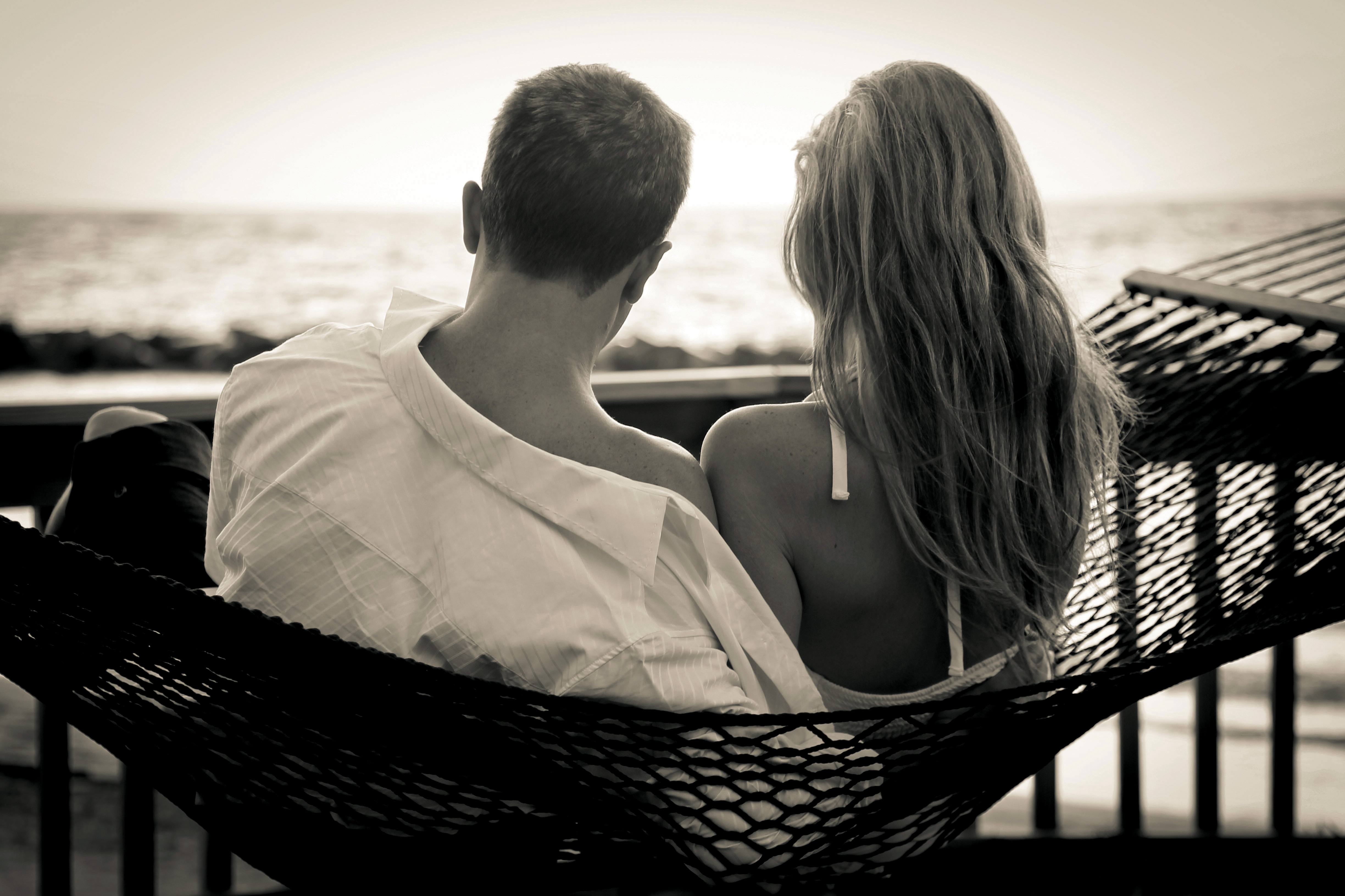 Couples cozy up in hammocks for two and enjoy Coconut Bay's spectacular views.