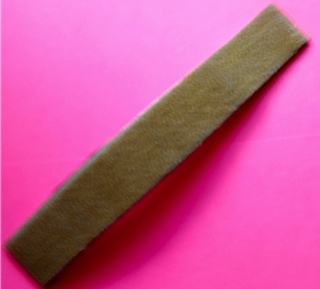 Top of Wrap is a smooth surface of Velcro loops. Size: 12" long by 2" wide.