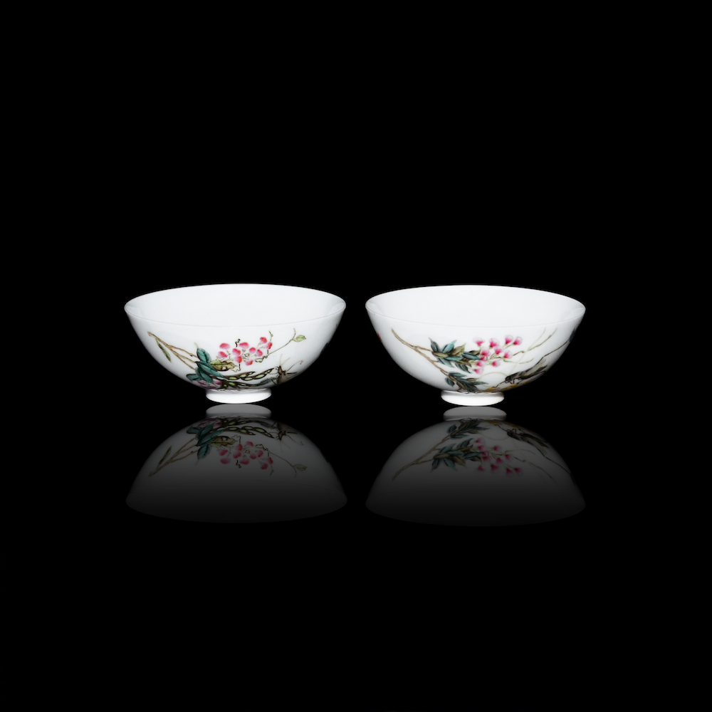 A pair of Qing Dynasty Famille-Rose Floral Bowls with Grasshoppers amidst blossoms on one and pea pods on the other. Each is inscribed with a poem. Lot 190. $1,000,000-$1,500,000