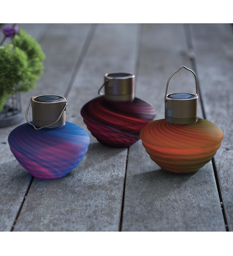 Artfully hanging from a tree, shepherd’s hook or sitting on a garden wall, these beehive-shaped lanterns add a pop of color to your outdoor oasis during the day and deliver a color-changing, LED glow