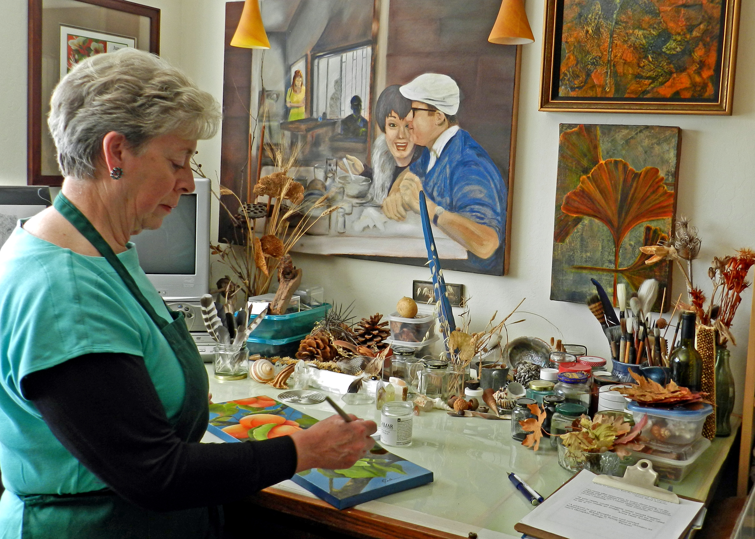 Artist jean Cullinane painting in her studio