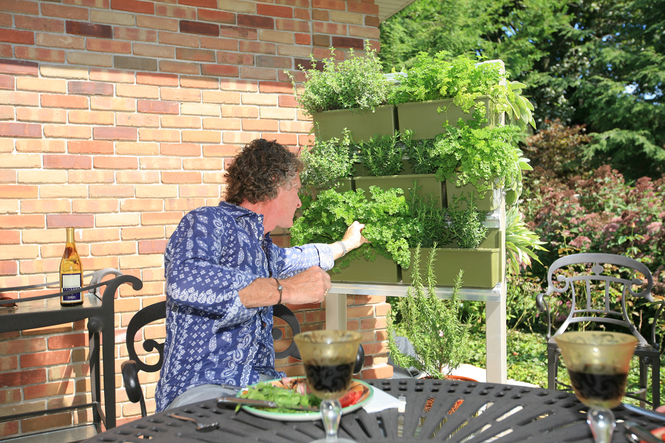 LiveWall vertical gardens in outdoor kitchens provide fresh herbs and vegetables within arm's length.