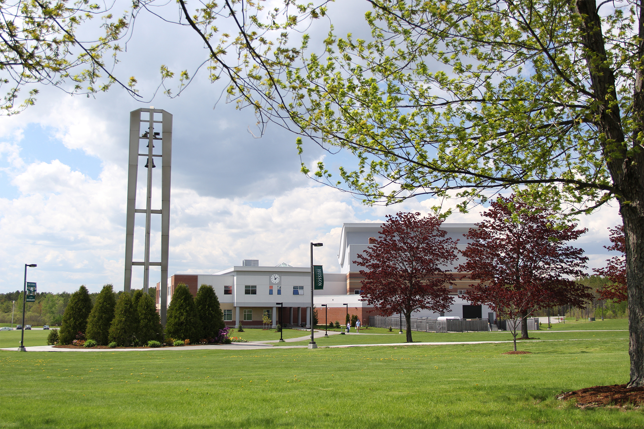 The campus of Husson University blossoms in the spring.