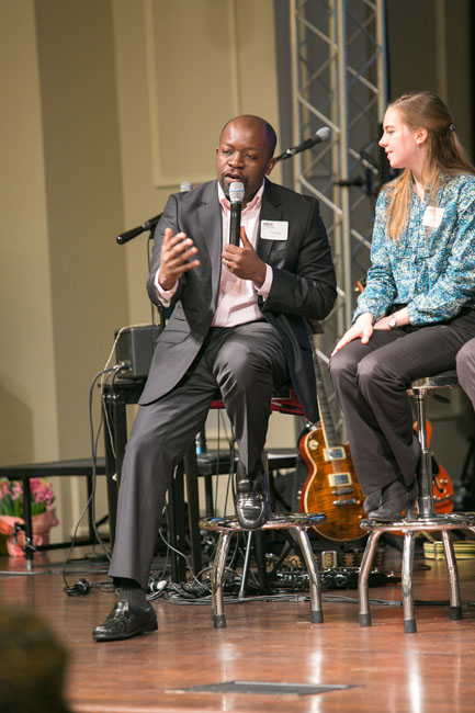 Patrice Tsague, founder of the Nehemiah Project and a global thought leader in Biblical entrepreneurship, speaks at an AWOP event. (Memories Matter Photo)