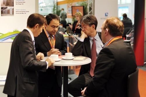 Zakiul Kabir of ClearEdge Power in South Windsor, Conn., talks with attendees at Hannover Messe.