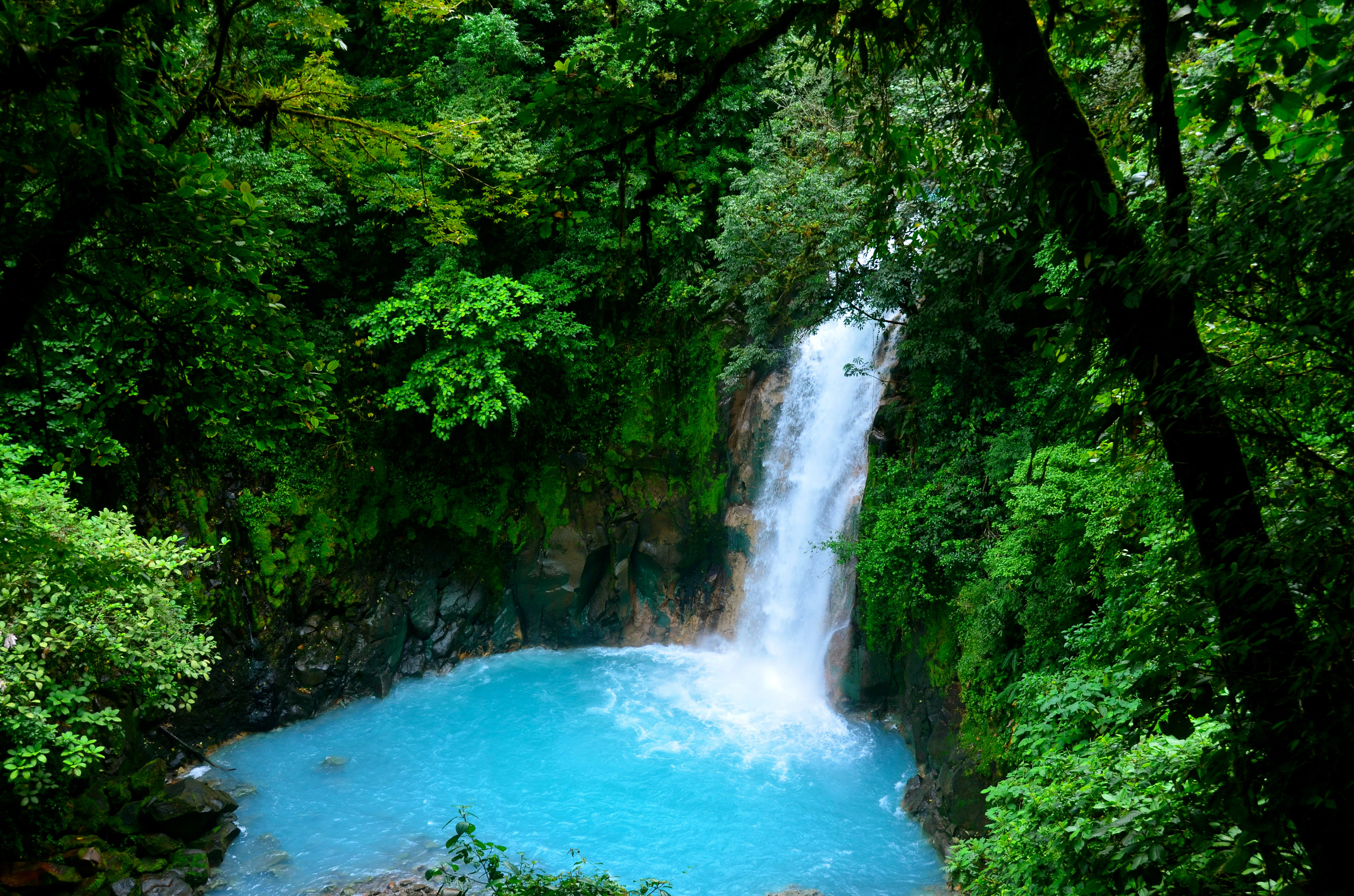 Rio Celeste Waterfall in Costa Rica on a Metamorphosis Sustainability Retreat