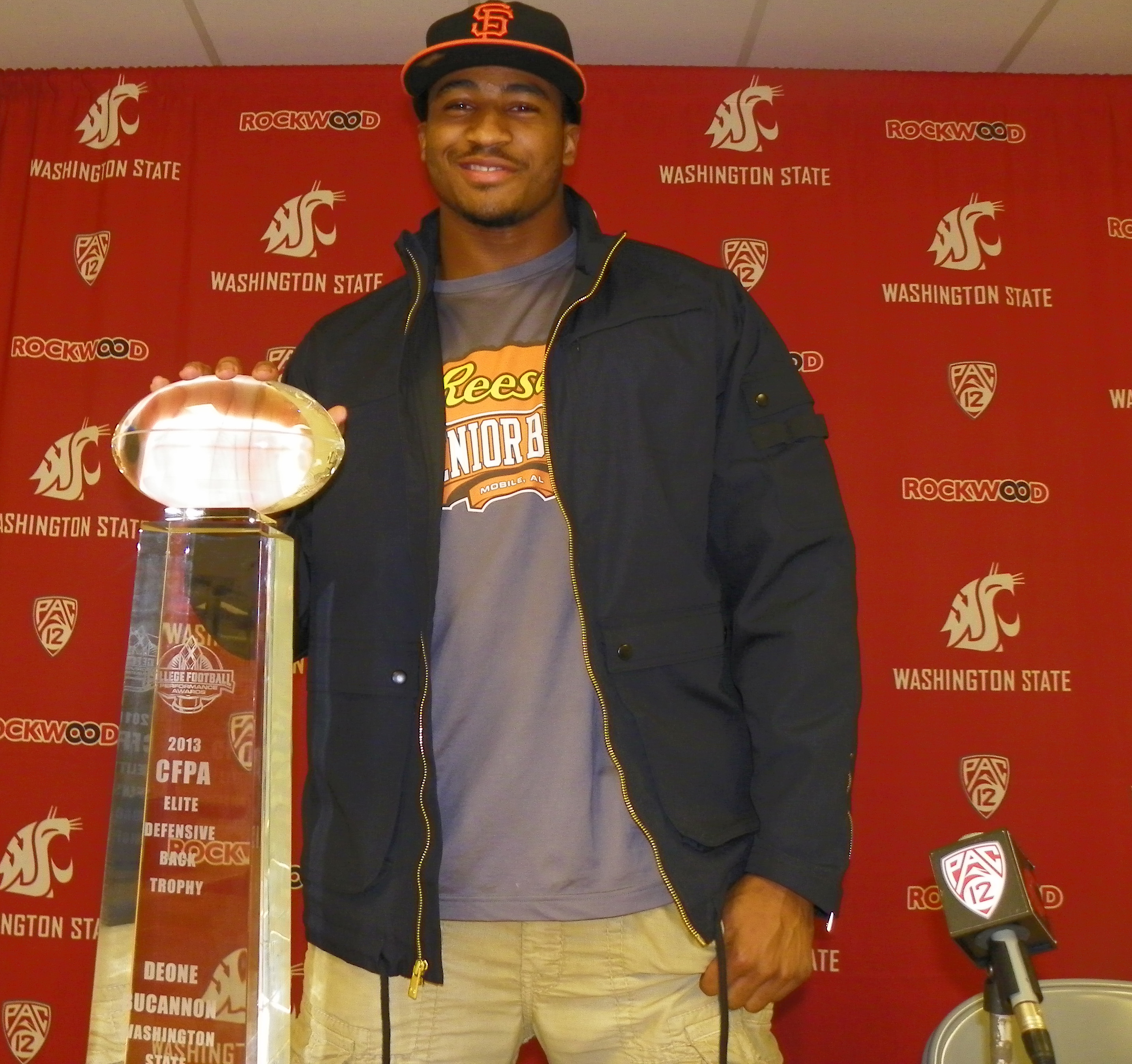 Deone Bucannon with the CFPA Trophy