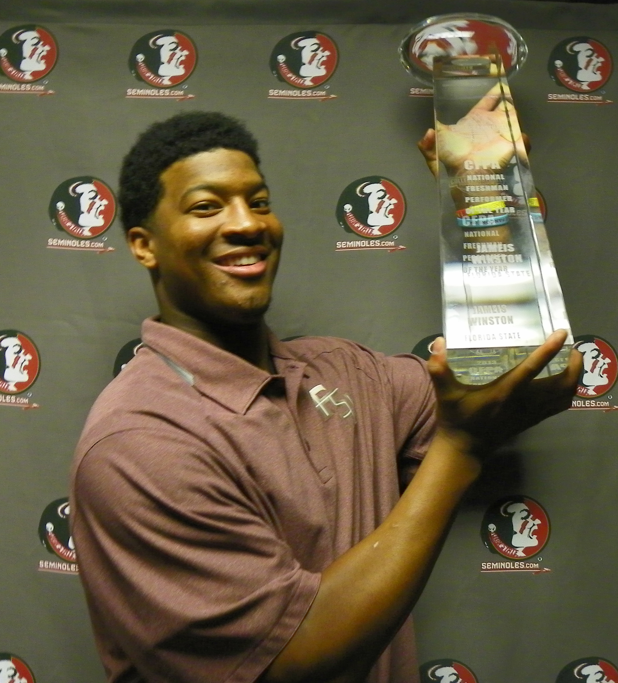 Jameis Winston with the CFPA Trophy