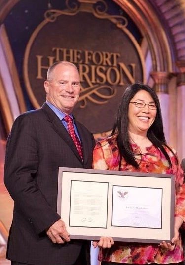 Jim and Fu Mei Mathers received a President’s Volunteer Service Award in April 2013 at a Volunteer Week celebration at the Church of Scientology Flag Service Organization in Clearwater, Florida.