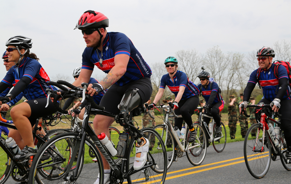 Team Booz Allen Hamilton riders are welcomed in Gettysburg in April, 2013. Photograph by Kimberly Warpinski.