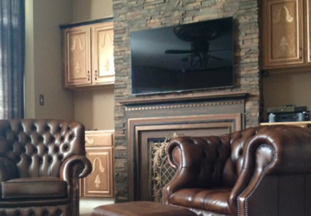 Faux stone panels make a stunning accent wall in any living space.