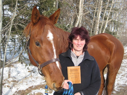 Susan Rauhut and horse Webster with ProChaps/NCCP Coaching Award
