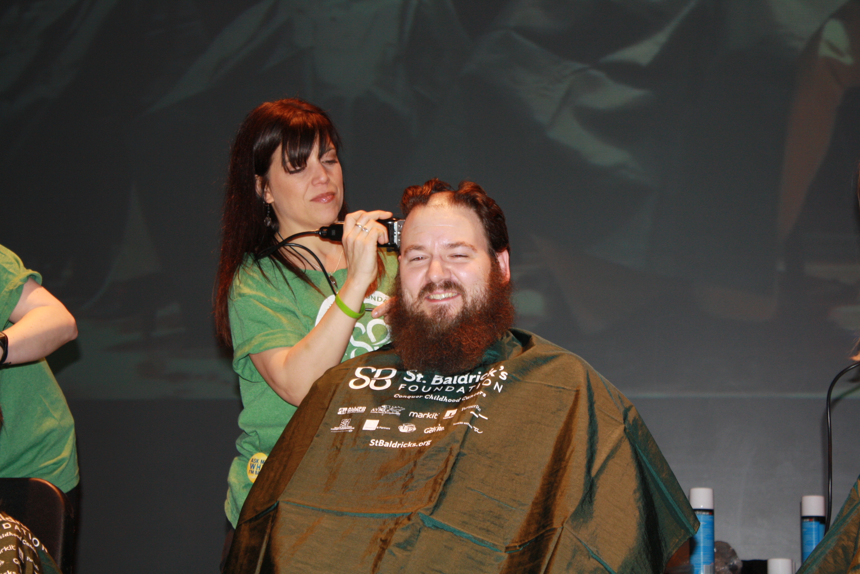 Say goodbye to the beard and the hair! University School parent Ross Duncan does his part for childhood cancer research.