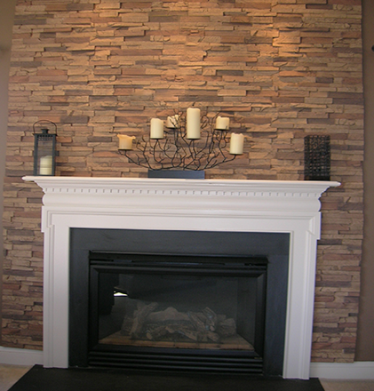 Client Install Faux Stacked Stone Fireplace Wall, product from FauxPanels.com