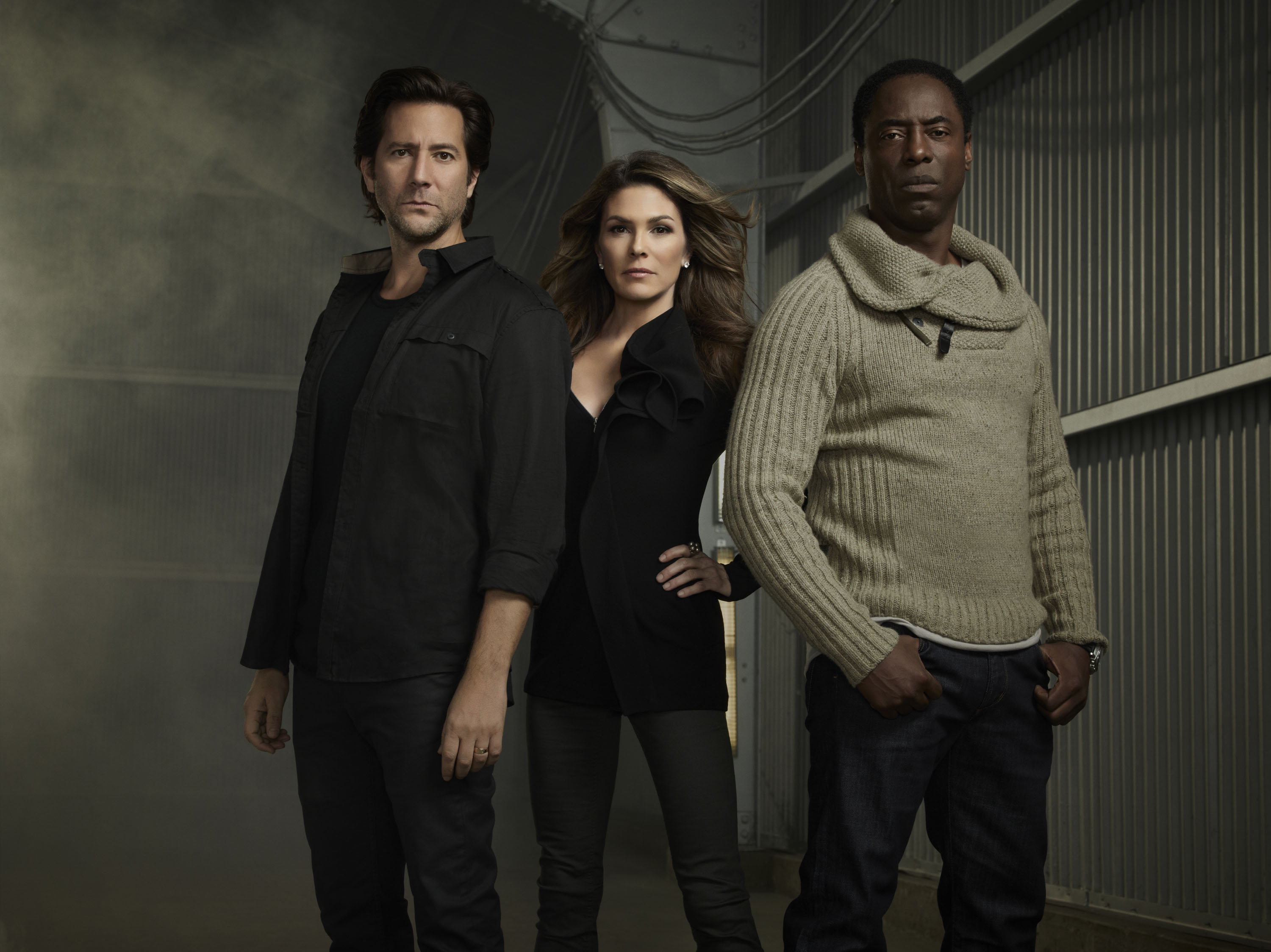 (L-R): Henry Ian Cusick, Paige Turco and Isaiah Washington star in the sci-fi drama series THE 100, airing Wednesdays at 9/8c on The CW.