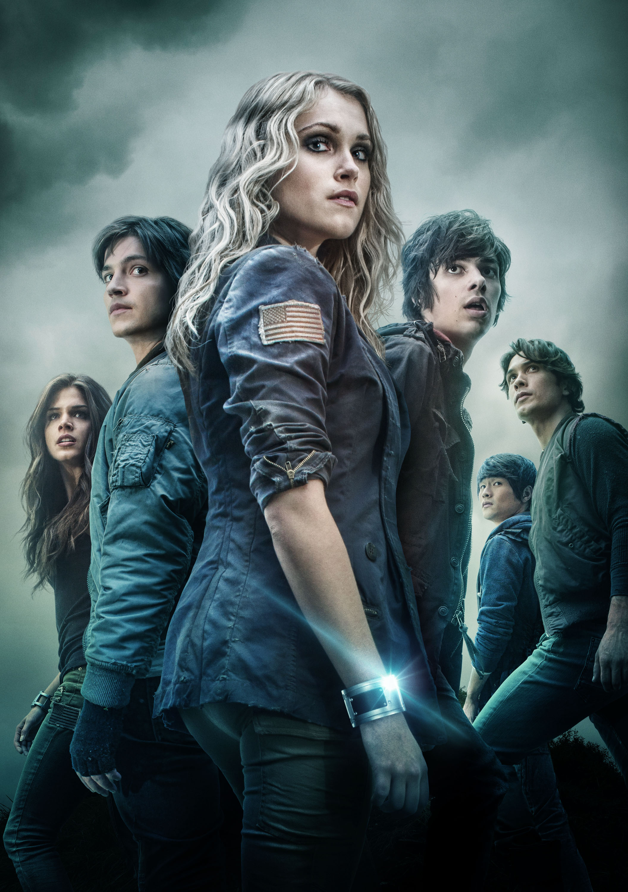 (L-R): Marie Avgeropoulos, Thomas McDonell, Eliza Taylor, Devon Bostick, Chris Larkin and Bob Morley star in the sci-fi drama series THE 100, airing Wednesdays at 9/8c on The CW.