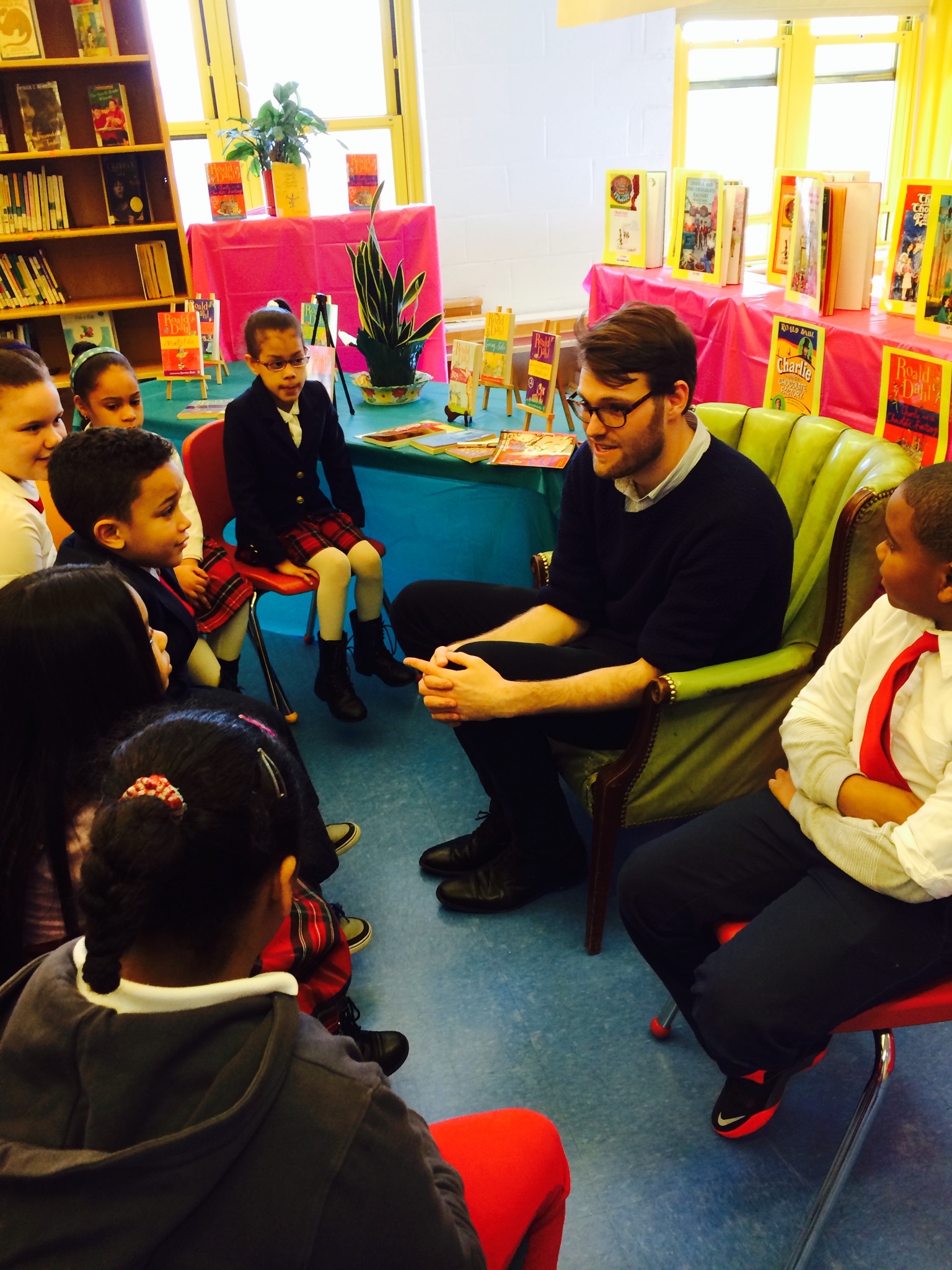 Luke Kelly reads to students at P.S. 8 Luis Belliard in New York City