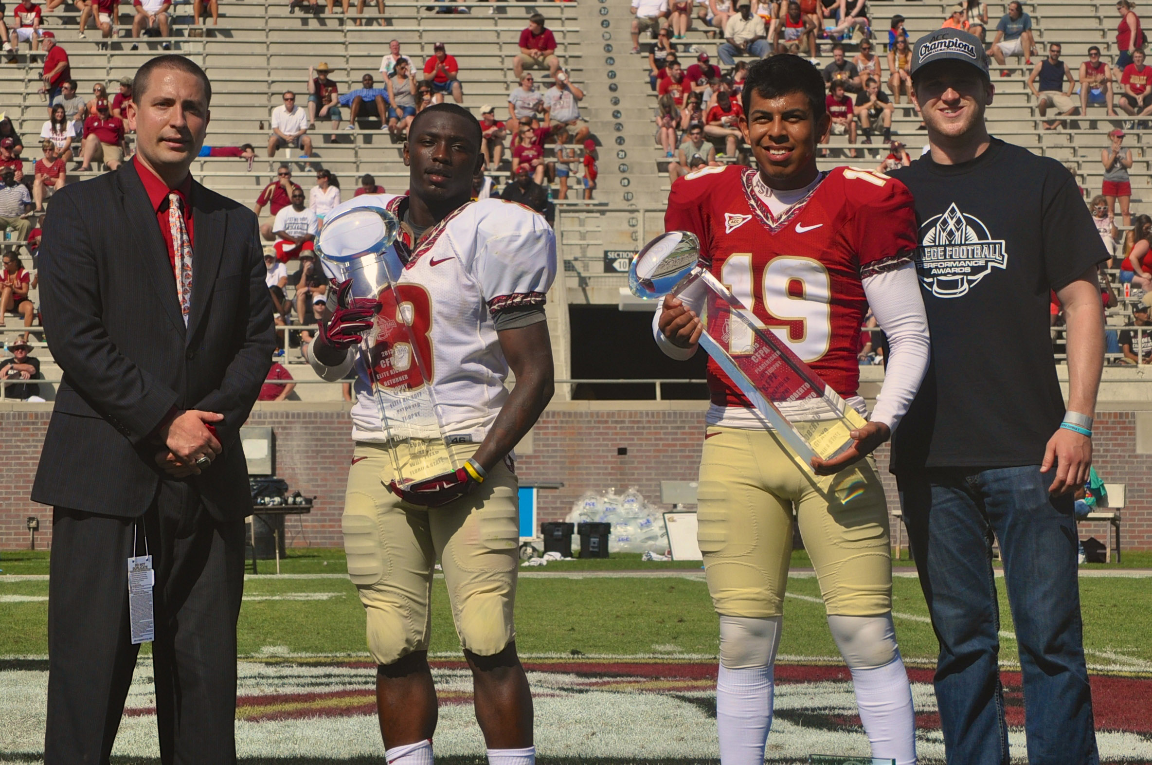 CFPA Executive Director Brad Smith, Levonte Whitfield, Roberto Aguayo, and Dustin Hopkins