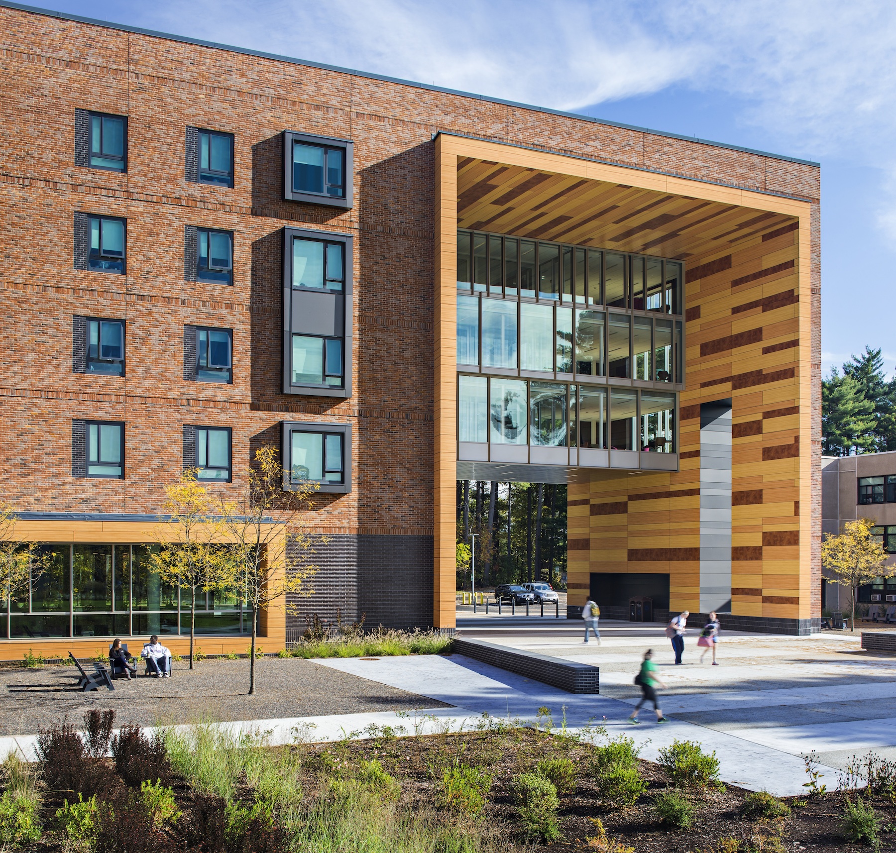 ADD Inc created a building with a large arch that leads from a wooden overlook of the Tekoa Mountains back to the campus quad.